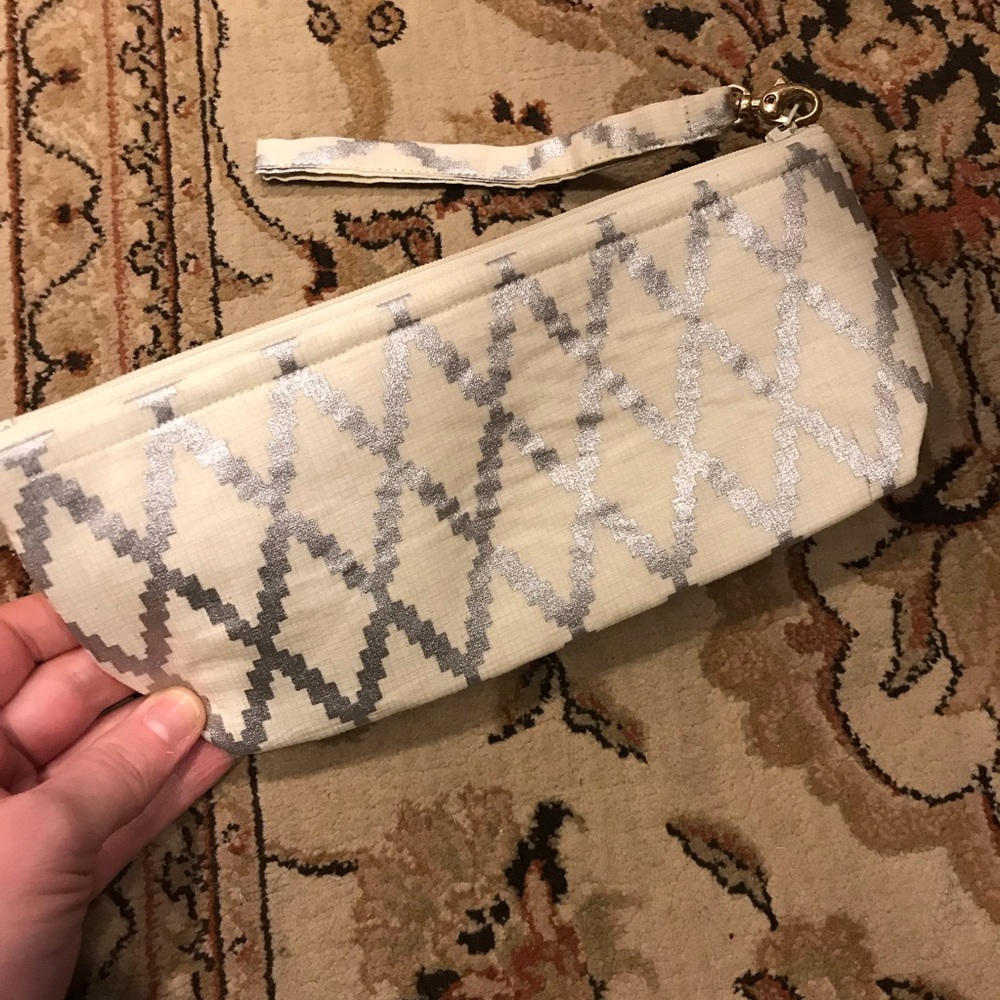NWOT silver off white wristlet